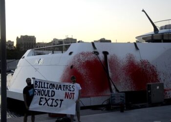 Activists spray red paint over billionaire Walmart heiress’s superyacht for a second time | CNN