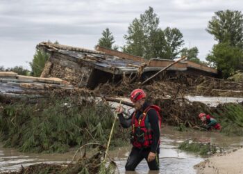 Boy rescued after spending the night clinging to a tree to escape deadly flooding in Spain | CNN