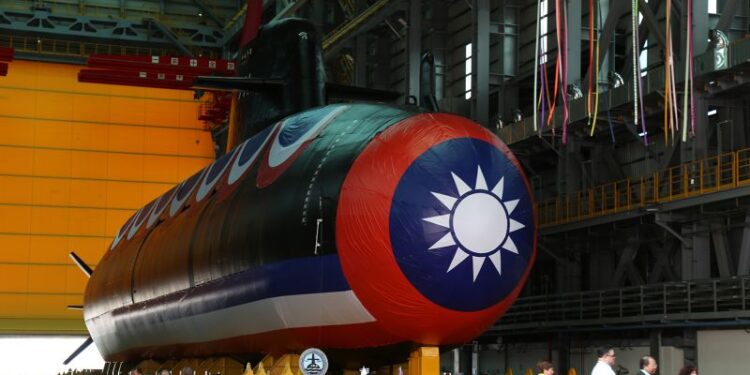 Taiwan unveils first domestically built submarine as China threat grows | CNN