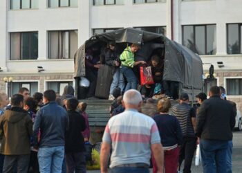 Thousands of ethnic Armenians flee Nagorno-Karabakh after breakaway region’s defeat | CNN