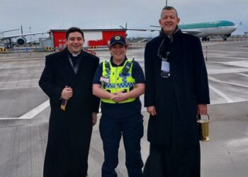 Airport falls silent as priest blesses planes | CNN