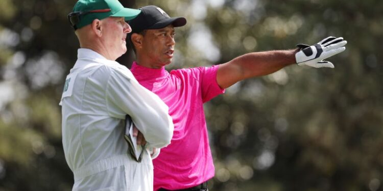 Why caddies wear white jumpsuits at the Masters | CNN Why caddies wear white jumpsuits at the Masters | CNN