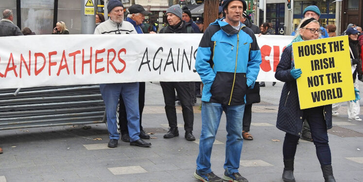 Why are people protesting against asylum seekers in Ireland?